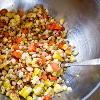corn, carrot, wheat berry, navy bean salad with soy sauce dressing and sriracha